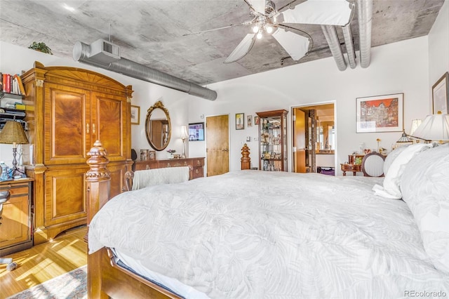 1401 Wewatta St Unit 806, Denver, CO 80202 - bedroom with light wood-style floors and a ceiling fan