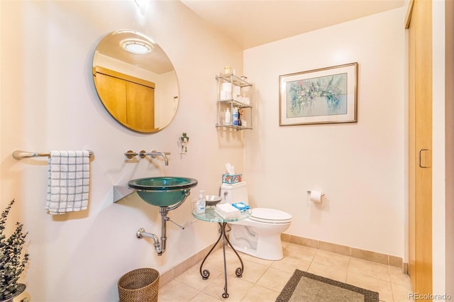 1401 Wewatta St Unit 806, Denver, CO 80202 - bathroom with toilet and tile patterned flooring