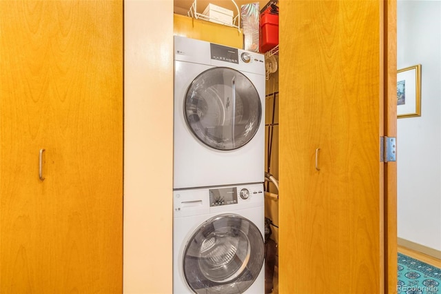 1401 Wewatta St Unit 806, Denver, CO 80202 - laundry room with stacked washing machine and dryer