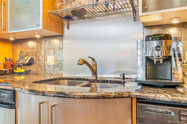 1401 Wewatta St Unit 806, Denver, CO 80202 - kitchen featuring dishwasher, dark stone countertops, and decorative backsplash