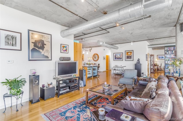 1401 Wewatta St Unit 806, Denver, CO 80202 - living area with wood finished floors