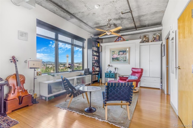 1401 Wewatta St Unit 806, Denver, CO 80202 - living area featuring wood-type flooring