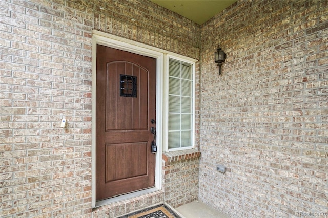 15594 E 97th Ave, Commerce City, CO 80022 - doorway to property with brick siding