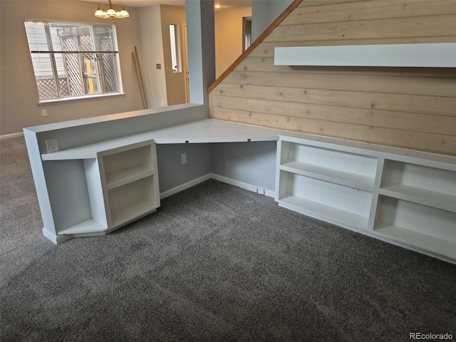 2238 S Nile Ct, Aurora, CO 80014 - unfurnished office with dark carpet, a chandelier, baseboards, and wooden walls