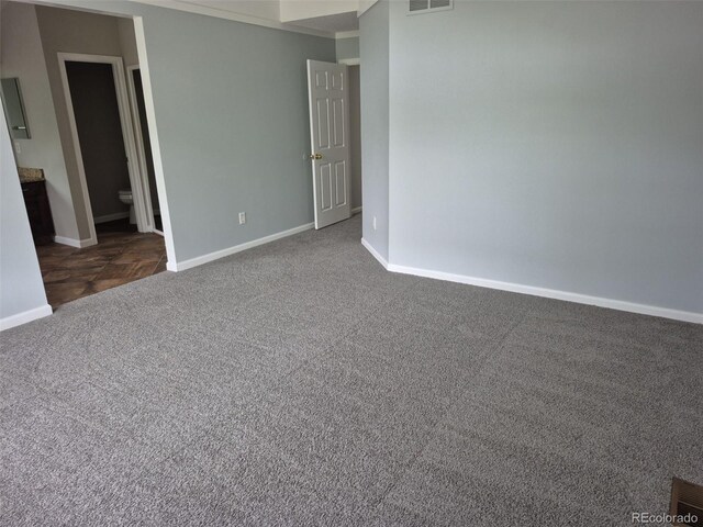 2238 S Nile Ct, Aurora, CO 80014 - spare room with dark carpet and baseboards