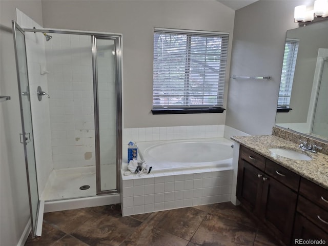 2238 S Nile Ct, Aurora, CO 80014 - bathroom featuring vanity, a bath, and a shower stall