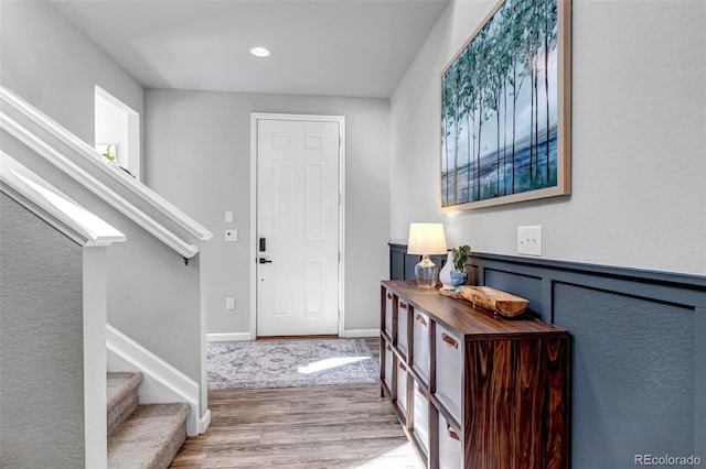 4840 Point Mesa St, Castle Rock, CO 80108 - foyer with wood finished floors, stairs, and recessed lighting