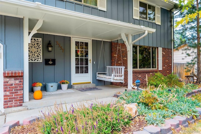 property entrance with covered porch