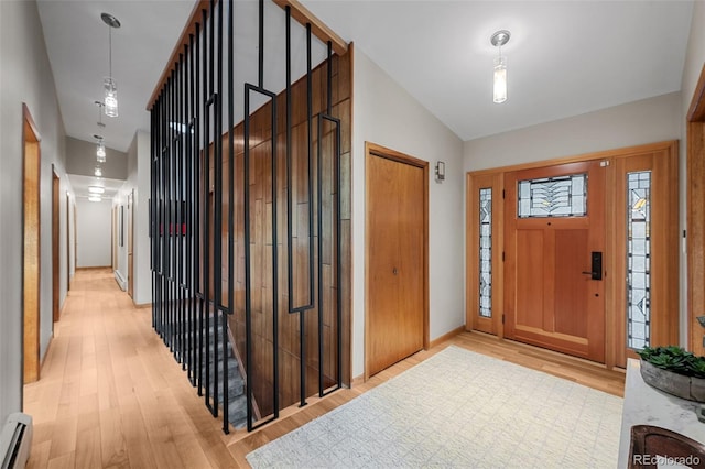 3 Twilight Dr, Wheat Ridge, CO 80215 - entrance foyer featuring a baseboard radiator and light wood-style flooring