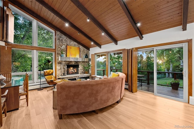 3 Twilight Dr, Wheat Ridge, CO 80215 - living area with a wood ceiling with exposed beams, a stone fireplace, light wood finished floors, high vaulted ceiling, and plenty of natural light