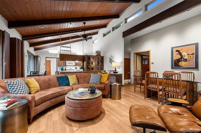 3 Twilight Dr, Wheat Ridge, CO 80215 - living area featuring a wooden ceiling with exposed beams, high vaulted ceiling, and light wood-type flooring