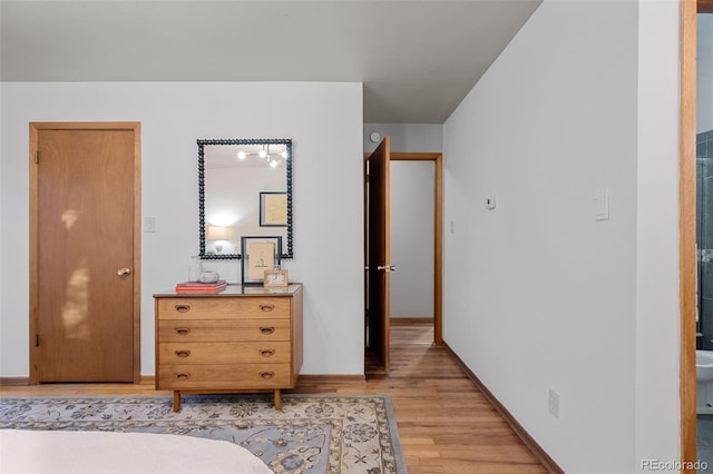 3 Twilight Dr, Wheat Ridge, CO 80215 - bedroom featuring light wood-style floors and baseboards