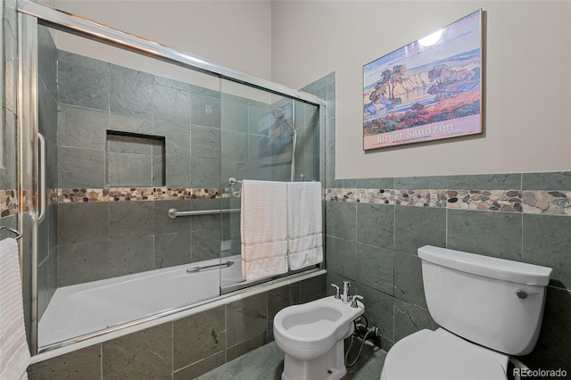 3 Twilight Dr, Wheat Ridge, CO 80215 - full bathroom with tiled shower / bath, a bidet, tile walls, and wainscoting