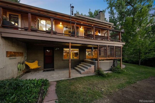 3 Twilight Dr, Wheat Ridge, CO 80215 - rear view of property with a patio area, a chimney, brick siding, and a yard