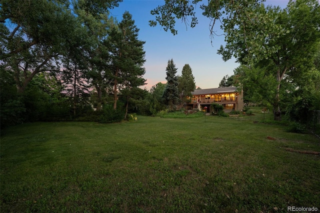 3 Twilight Dr, Wheat Ridge, CO 80215 - view of green lawn with a wooden deck