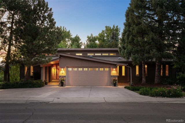 3 Twilight Dr, Wheat Ridge, CO 80215 - view of front of house with concrete driveway and an attached garage