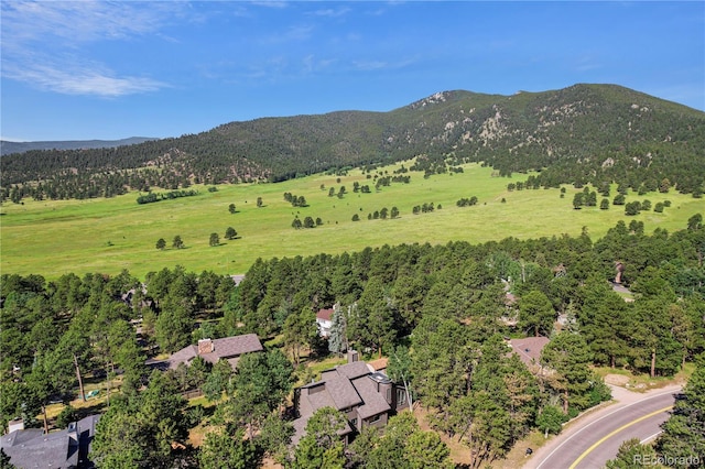 2289 Hiwan Dr, Evergreen, CO 80439 - drone / aerial view of mountains and a heavily wooded area