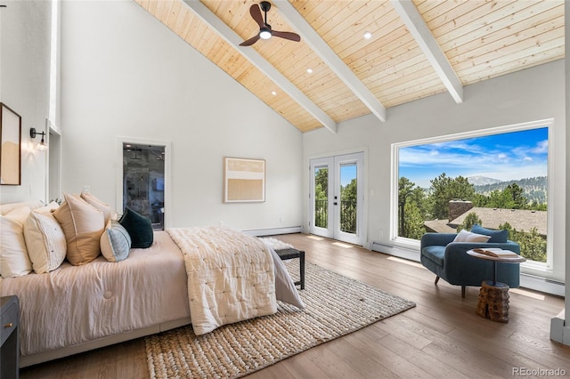 2289 Hiwan Dr, Evergreen, CO 80439 - bedroom with access to exterior, high vaulted ceiling, a baseboard radiator, a wood ceiling with exposed beams, and french doors