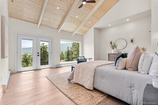 2289 Hiwan Dr, Evergreen, CO 80439 - bedroom featuring access to outside, a wooden ceiling with exposed beams, french doors, a baseboard radiator, and wood finished floors