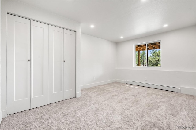 2289 Hiwan Dr, Evergreen, CO 80439 - unfurnished bedroom with a baseboard radiator, carpet, recessed lighting, and a closet