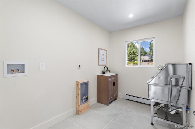 2289 Hiwan Dr, Evergreen, CO 80439 - misc room with a baseboard radiator and light tile patterned flooring