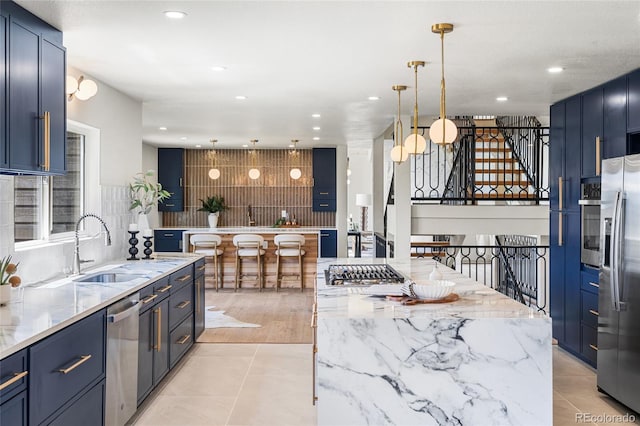 2289 Hiwan Dr, Evergreen, CO 80439 - kitchen featuring appliances with stainless steel finishes, recessed lighting, light stone countertops, light tile patterned floors, and tasteful backsplash
