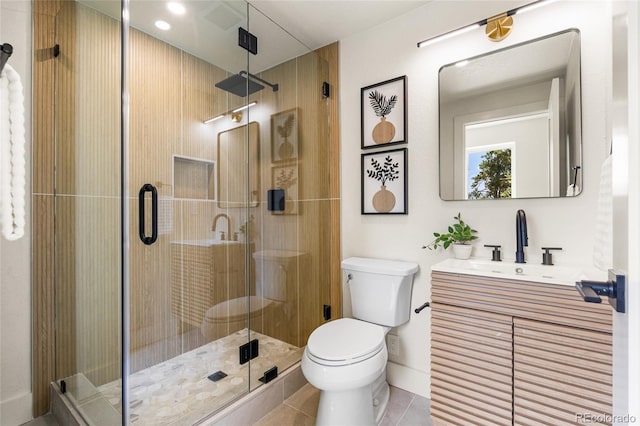 2289 Hiwan Dr, Evergreen, CO 80439 - bathroom featuring vanity, a shower stall, and tile patterned floors