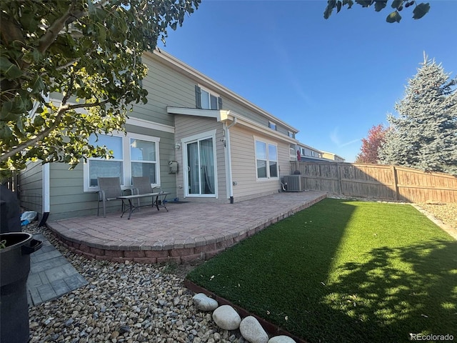 6187 Wescroft Ave, Castle Rock, CO 80104 - back of property with a patio area and central air condition unit