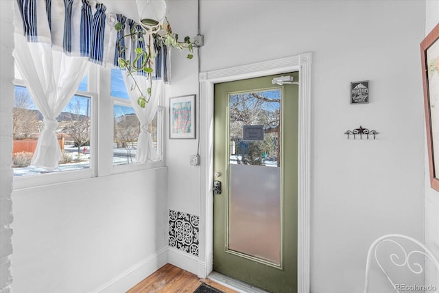 doorway featuring hardwood / wood-style flooring