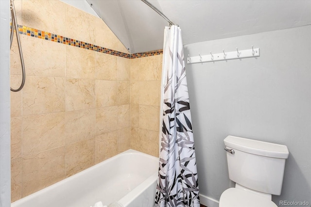 bathroom with toilet and shower / bath combo with shower curtain