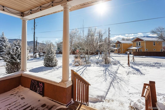 view of yard covered in snow