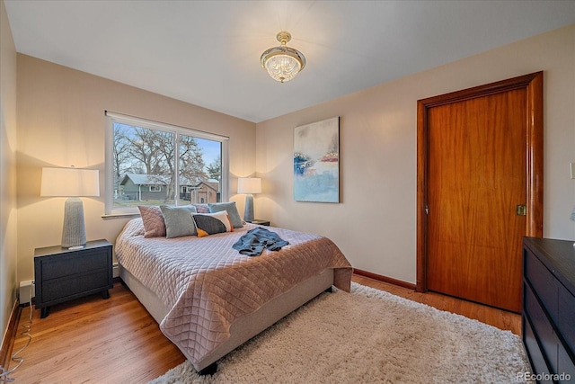 bedroom featuring light hardwood / wood-style flooring