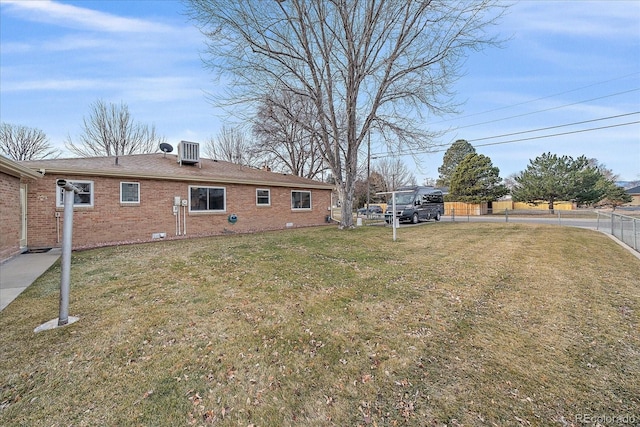 view of yard with central AC