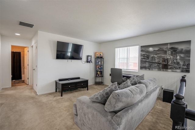 26985 E Bayaud Ave, Aurora, CO 80018 - carpeted living room featuring baseboards