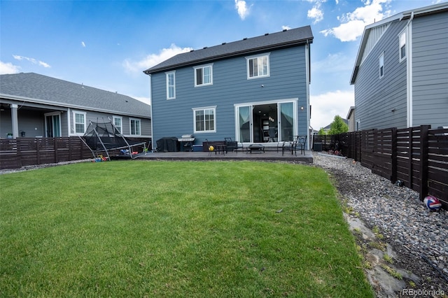 26985 E Bayaud Ave, Aurora, CO 80018 - rear view of property featuring a patio