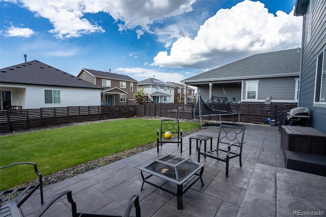 26985 E Bayaud Ave, Aurora, CO 80018 - view of patio with a trampoline, an outdoor fire pit, a residential view, and grilling area