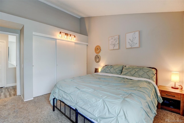 bedroom featuring a closet and carpet flooring