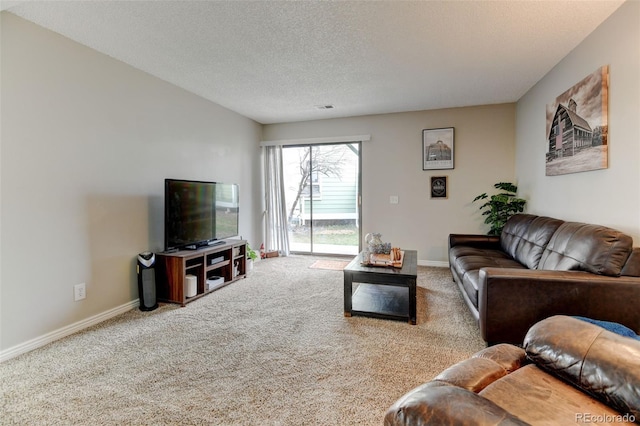 living room with baseboards, carpet, and visible vents