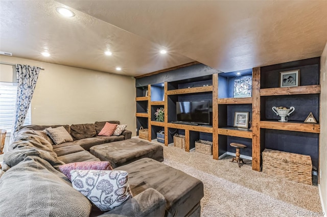 living room featuring carpet flooring, recessed lighting, and a textured ceiling