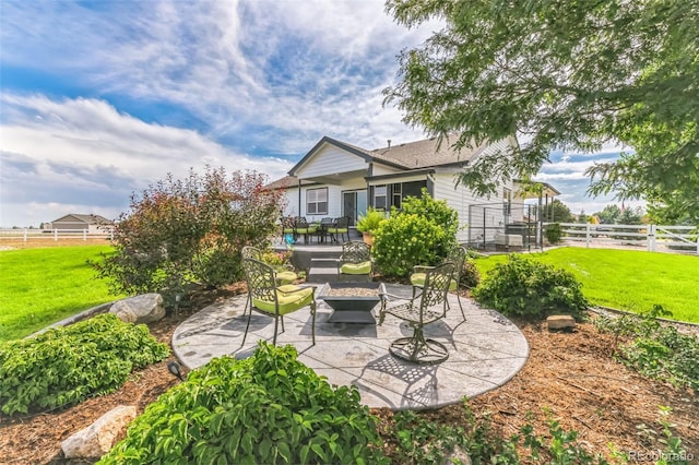 view of patio / terrace featuring fence and an outdoor fire pit