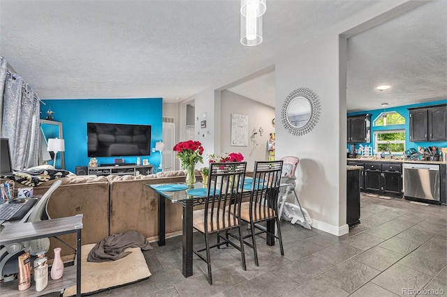 1390 W 78th Cir, Denver, CO 80221 - dining space featuring a textured ceiling