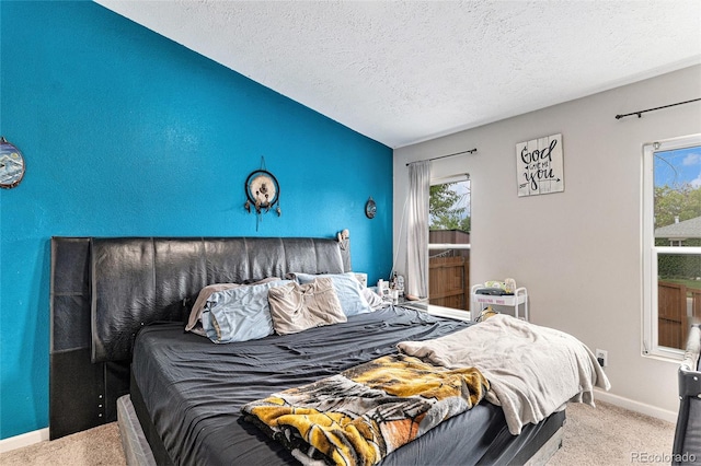 1390 W 78th Cir, Denver, CO 80221 - carpeted bedroom featuring a textured ceiling and vaulted ceiling