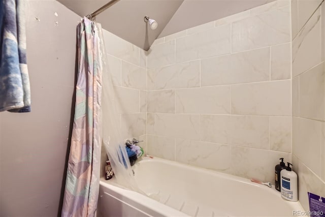 bathroom featuring shower / bath combination with curtain