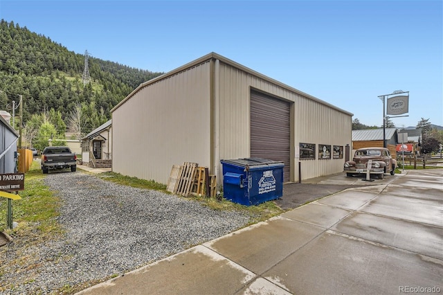 view of outdoor structure with a garage