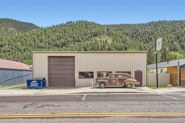 garage featuring a mountain view