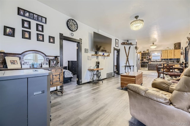 living room featuring light wood-type flooring