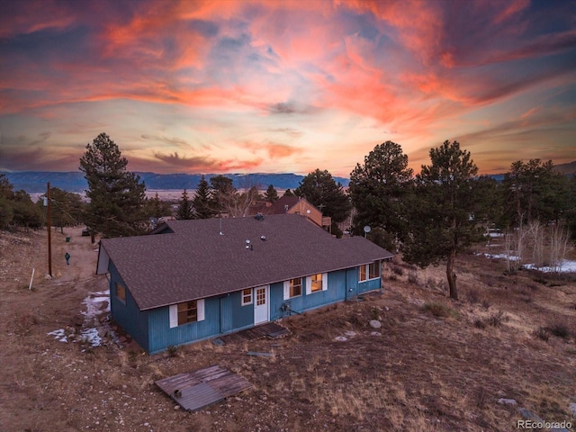 aerial view at dusk with a mountain view