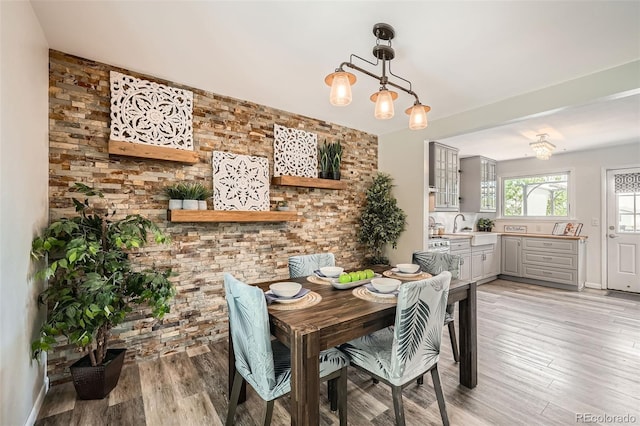 dining area with light wood-style floors
