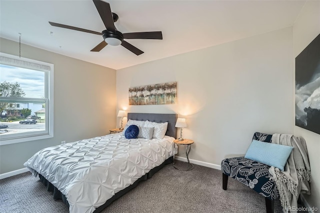 bedroom with carpet flooring, baseboards, and a ceiling fan