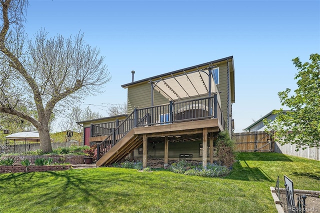 back of property featuring stairs and a deck